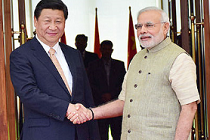 Modi shaking hands with Xi Jinping