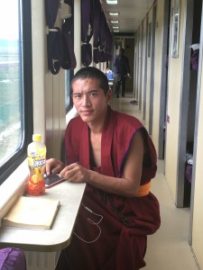 All of Tibet travels on the train, from monks to peasants to government functionaries