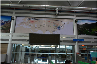 Photo 9: The cordoned off immigration and security check section at Dorasan Station, for passengers going to and fro Pyongyang, and a map showing the rail route to Europe (Photo by Purvaja Modak)