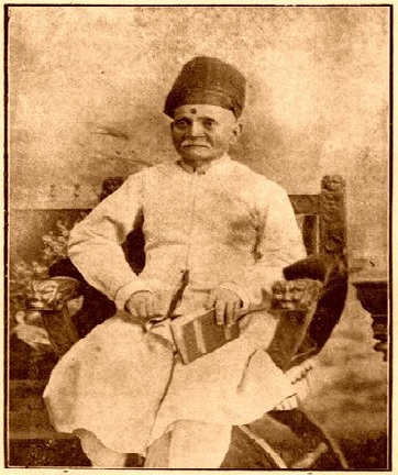 A portrait of Seth Premchund Roychand. Roychand's turban is typical of the Vania community from Surat.