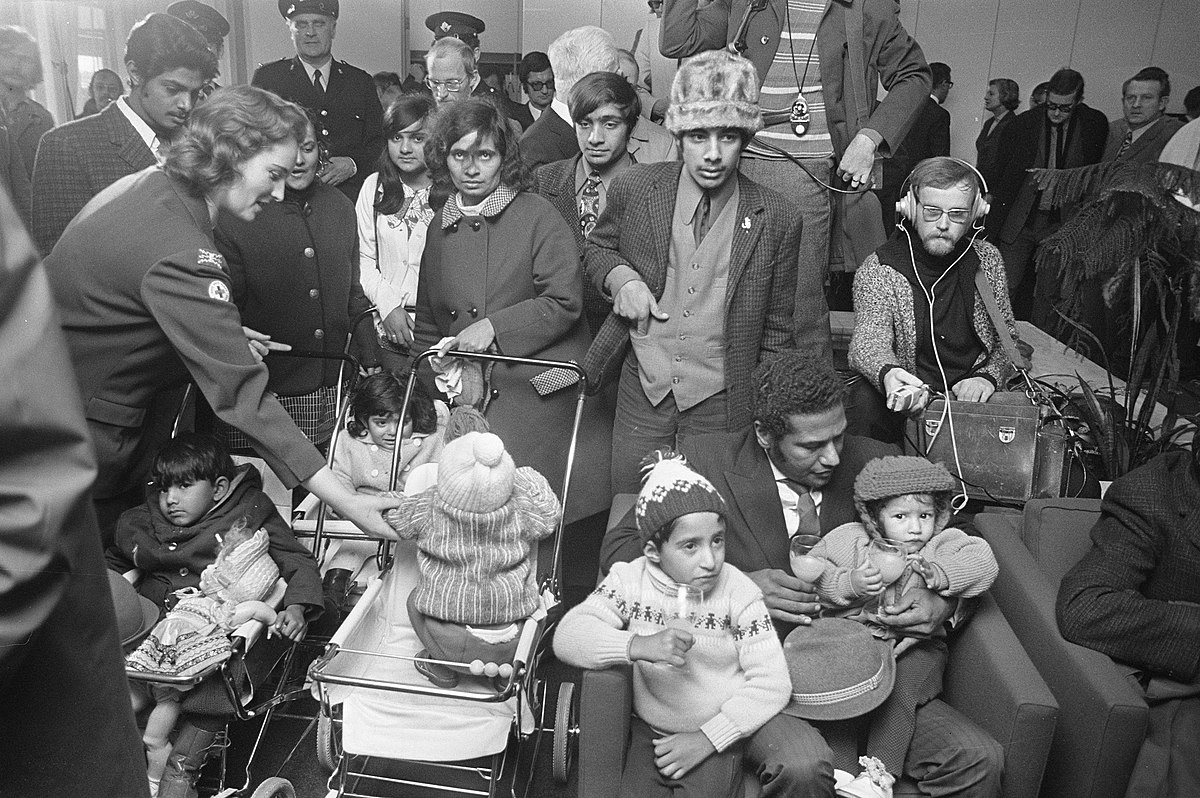 East African Indians at the airport in The Netherlands after fleeing Uganda. Many settled in the UK. Source: Wikimedia Commons