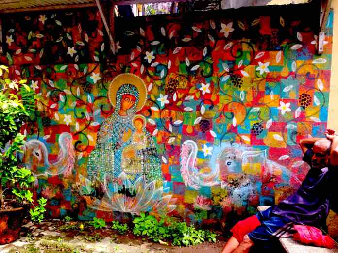 A mural of Our Lady of Fatima painted on a wall just outside the oratory in Khotachiwadi